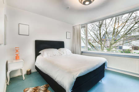 Beautiful bedroom in new luxury home with some decor