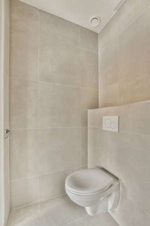 Interior of small clean restroom in miniature styleの写真素材