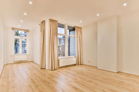 A luxurious room with a window in a stylish house