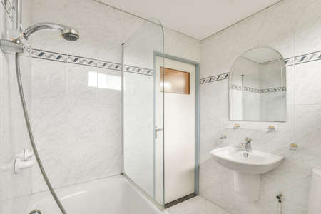 Luxury interior design of a bathroom with marble walls