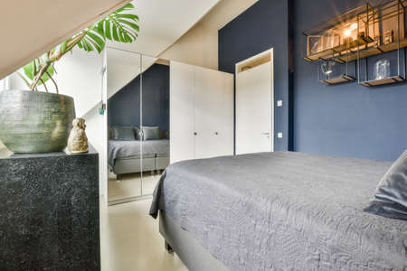 Beautiful bedroom in new luxury home with some decor