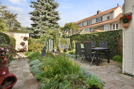 Large house with a garden in the backyardの写真素材