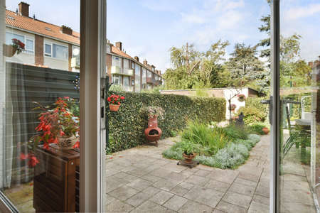 Large house with a garden in the backyardの写真素材