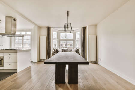 Stunning dining room with a large black table