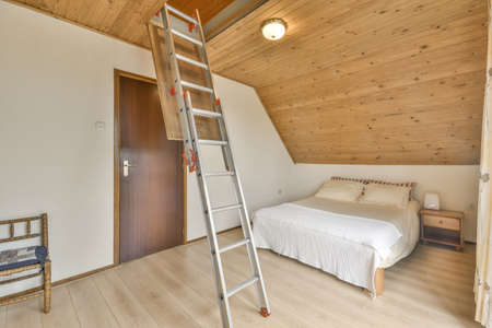 Beautiful bedroom in new luxury home with some decorの写真素材