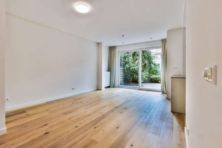 A wonderful room with a sliding glass door leading to the courtyardの写真素材