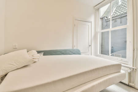 Small room with two mattresses white minimalist room