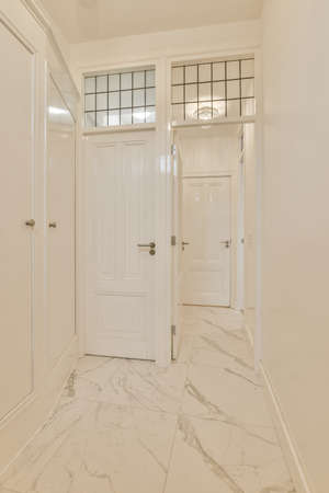 A long empty corridor designed in minimalistic style