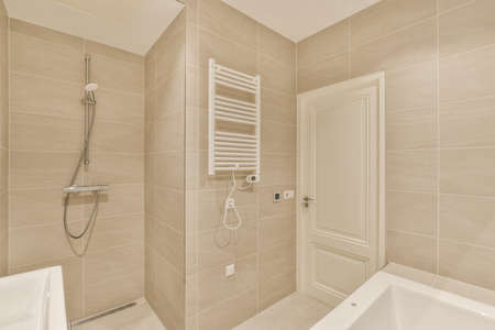 Modern shower stall in a bright bathroom