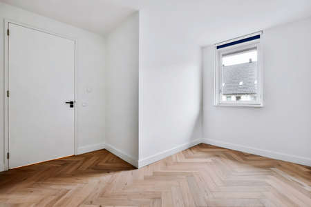 Modern design of a room in daylight with a wooden window