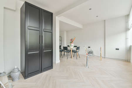interior of a kitchen under repair next to the sitting room