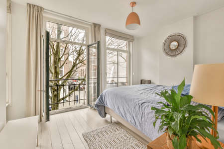 Beautiful bedroom in new luxury home with some decor