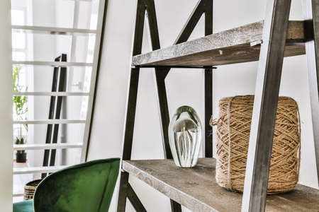 Stylish room with a wardrobe with shelves and decorの写真素材