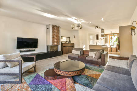 Beautiful living room interior with hardwood floorsの写真素材