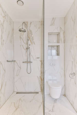 Amazing bathroom design with marble walls and floor in an elite house
