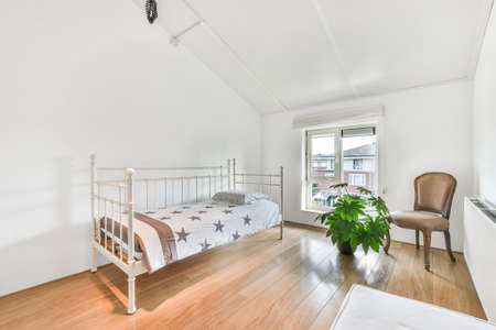 Modest bedroom for one person in a minimalist style