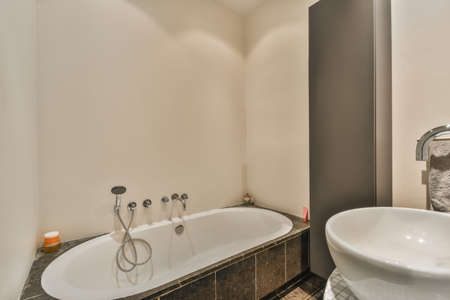 Luxury interior design of a bathroom with marble walls