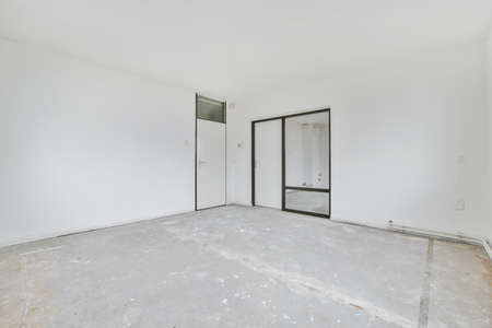 An amazing room with a door and light walls