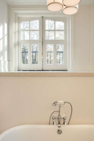 Luxurious bathroom with fresh renovation and plumbingの写真素材