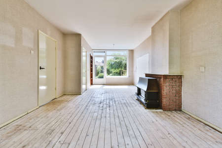 Delightful room with wooden floor and fireplace