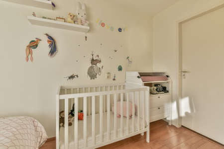 Childrens room with themed interior, bed and locker in a cozy houseの写真素材