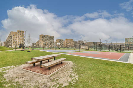 A large playground and sports ground in an open area within the cityの写真素材
