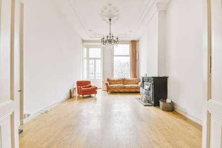Empty sitting room with parquet wooden floor