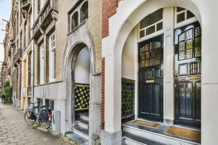 Entrance to the building with near walkside and bike