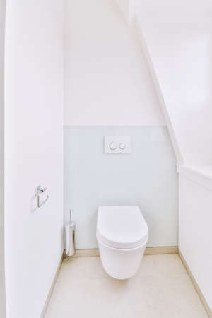 Interior of small clean restroom in miniature styleの写真素材
