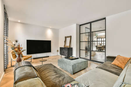 Cozy spacious and bright dining area with a wonderful view from a large window and tv