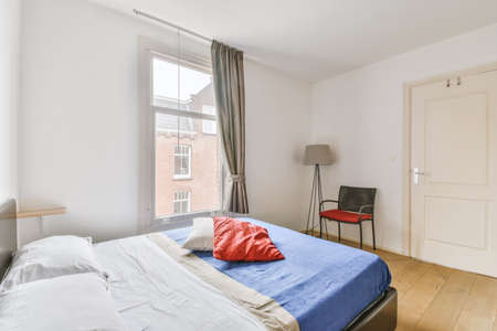 Home interior design of bedroom near window in modern apartment