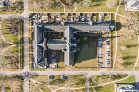 A birds-eye view of the city church with spacious parking and a manicured lawnの写真素材