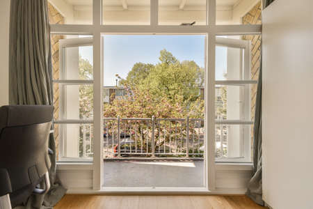 Front view of vegetation from small balcony with railings
