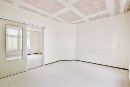 A cozy and spacious empty room in a luxury houseの写真素材