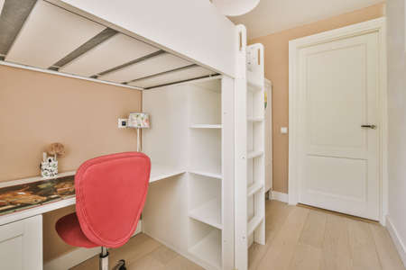 Home interior design of bedroom with bed and wooden wardrobe placed in corner near window in modern...