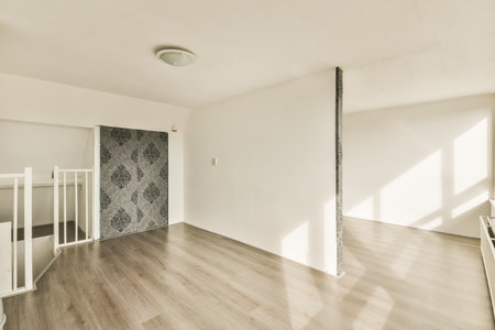 Glass partition between shower tap and wall hung toilet in modern restroom at homeの写真素材