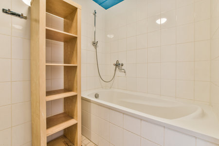 Mansard bathroom with tile wallsの写真素材