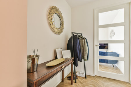 Interior of minimalist style narrow hallway with wardrobe and cabinet in modern apartmentの写真素材