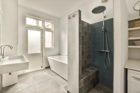a bathroom with a sink, shower and bathtub in the same color as it appears on the wall next to the...