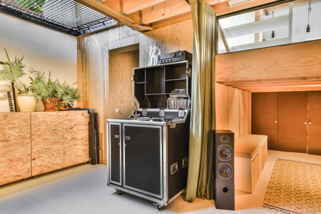 the inside of a house with wood walls and flooring in place to be used as an entertainment center or home theaterの写真素材