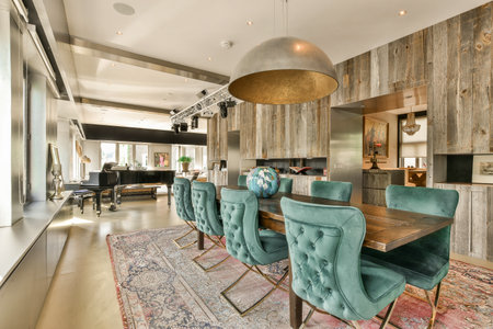 Amsterdam, Netherlands - 10 April, 2021: a dining room with wood paneled walls and an area rug on...