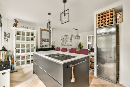 Amsterdam, Netherlands - 10 April, 2021: a kitchen with an island in the middle and lots of wine...