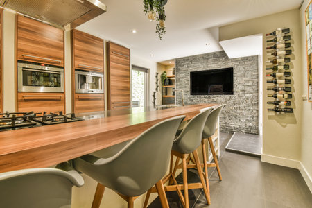 Amsterdam, Netherlands - 10 April, 2021: a modern kitchen with wood counter tops and stainless...