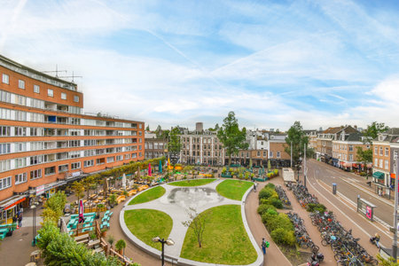 a city with lots of buildings and people walking around the area in the middle of the photo is taken from aboveのeditorial素材
