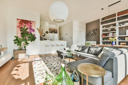 Amsterdam, Netherlands - 10 April, 2021: a living room with wood flooring and white walls, there is...