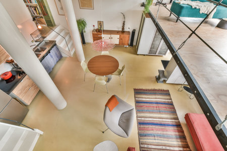 Amsterdam, Netherlands - 10 April, 2021: a living room with couchs, chairs and a coffee table in the center of the room is seen from aboveのeditorial素材