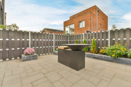 Amsterdam, Netherlands - 10 April, 2021: an outside area with some plants and flowers on the ground...