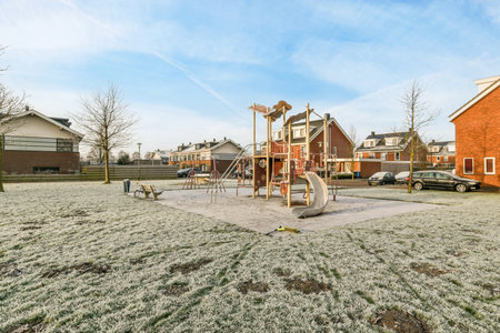 Amsterdam, Netherlands - 10 April, 2021: an empty playground in the middle of a residential area...