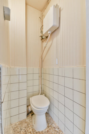 a bathroom that is in need of reurrectionment and renovation work on the walls, floor and ceilingのeditorial素材