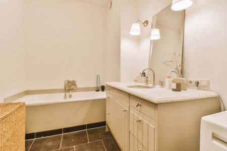 a bathroom with a sink, toilet and bathtub in the same room on the left side of the photo